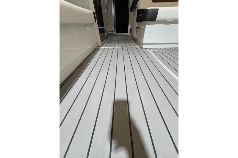  Yacht Photos Pics Interior view of 2023 Formula 400 Super Sport Crossover boat with sleek flooring design.