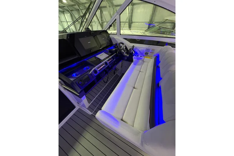  Yacht Photos Pics 2023 Formula 400 Super Sport Crossover cockpit with modern controls and luxurious seating.