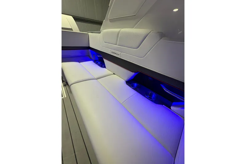  Yacht Photos Pics 2023 Formula 400 Super Sport Crossover interior with blue LED lighting and sleek seating.