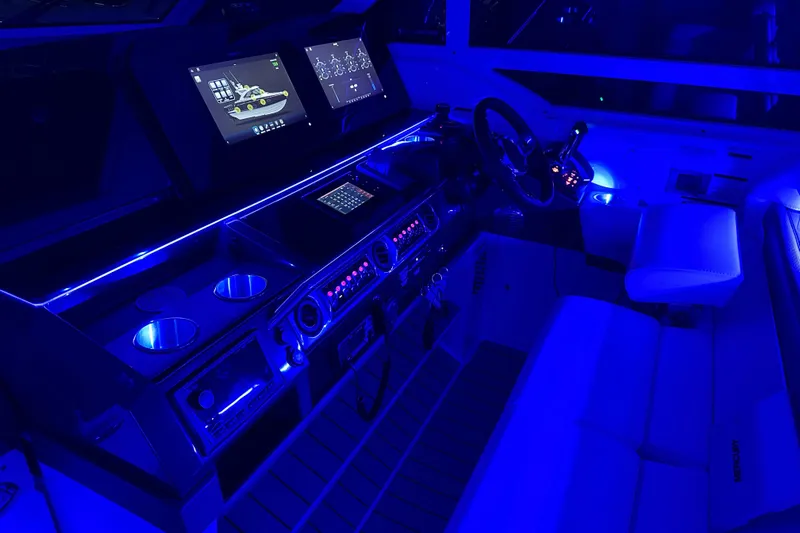  Yacht Photos Pics 2023 Formula 400 Super Sport Crossover cockpit with illuminated controls and modern displays.