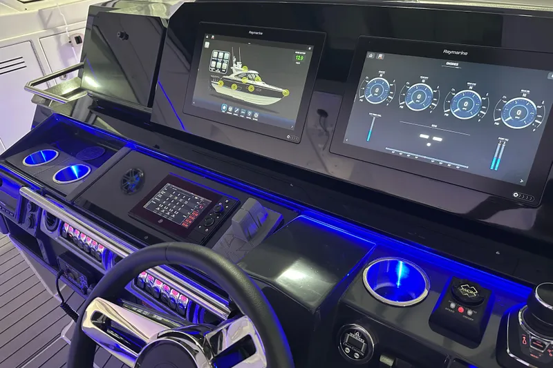  Yacht Photos Pics 2023 Formula 400 Super Sport Crossover dashboard with advanced navigation displays and illuminated controls.