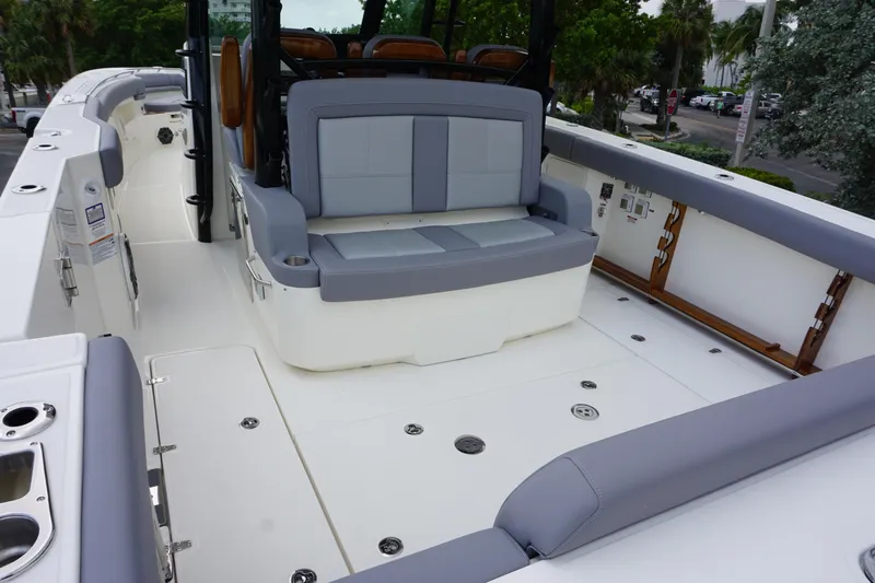 Bwcp0430a424 Yacht Photos Pics 2024 Boston Whaler 380 Outrage boat interior with cushioned seating and spacious deck.