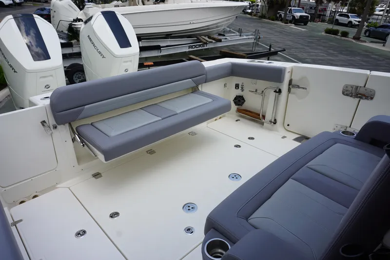 Bwcp0430a424 Yacht Photos Pics 2024 Boston Whaler 380 Outrage boat interior with seating and twin outboard engines.