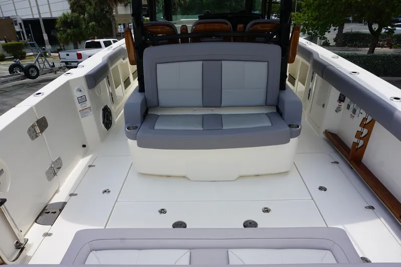 Bwcp0430a424 Yacht Photos Pics 2024 Boston Whaler 380 Outrage boat interior with cushioned seating and spacious deck.
