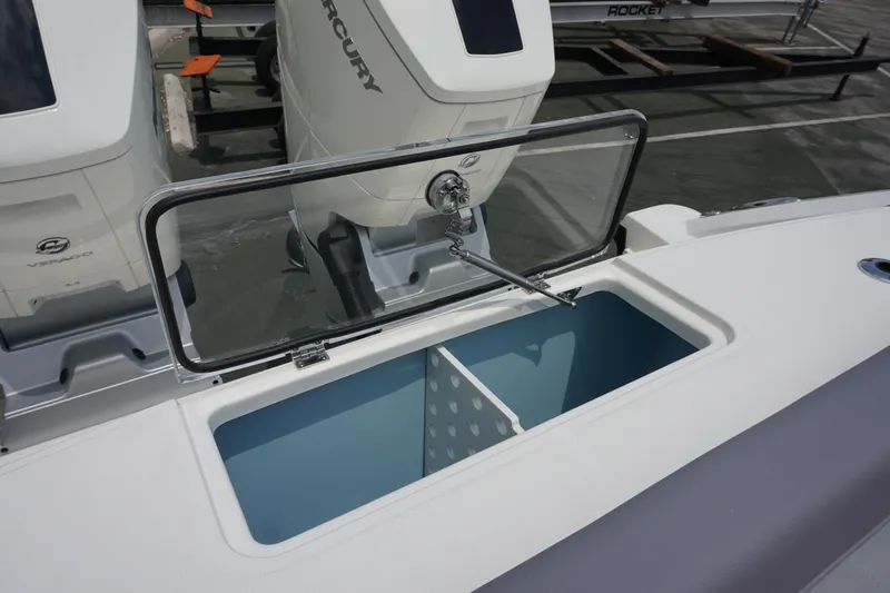 Bwcp0430a424 Yacht Photos Pics Boston Whaler 380 Outrage 2024 boat with open storage compartment and Mercury engines.