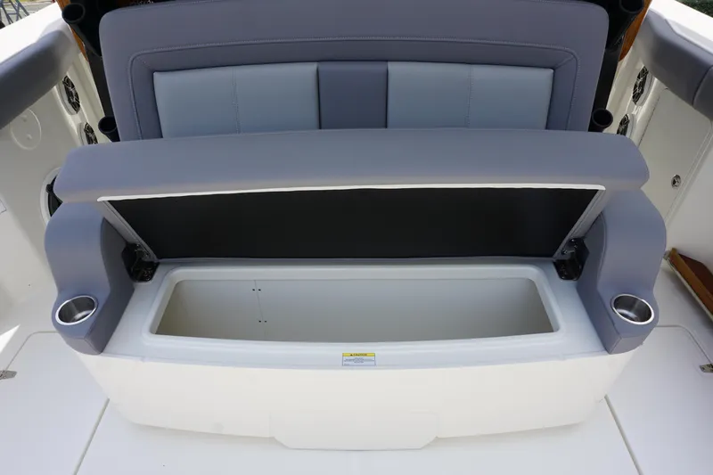 Bwcp0430a424 Yacht Photos Pics Boston Whaler 380 Outrage 2024 boat seat with storage compartment open.