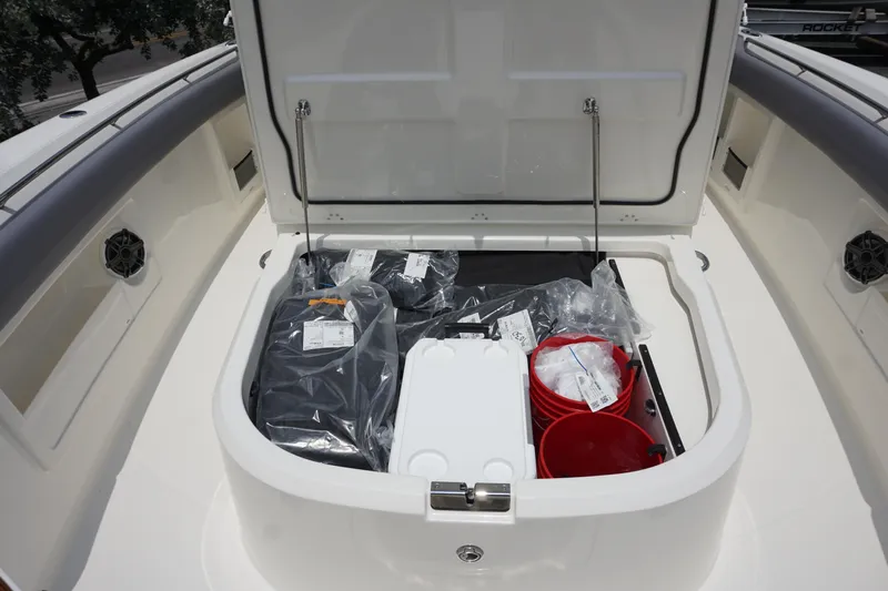 Bwcp0430a424 Yacht Photos Pics 2024 Boston Whaler 380 Outrage storage compartment with gear and supplies.