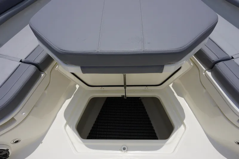 Bwcp0430a424 Yacht Photos Pics 2024 Boston Whaler 380 Outrage storage compartment with cushioned seating.