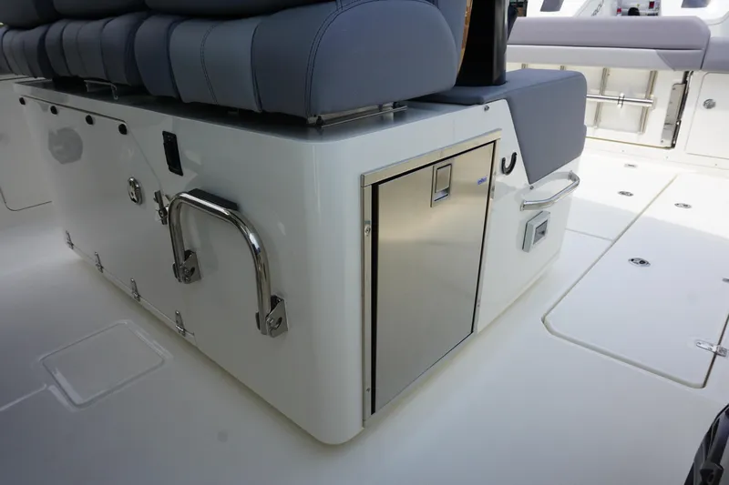 Bwcp0430a424 Yacht Photos Pics 2024 Boston Whaler 380 Outrage interior seating and storage area.