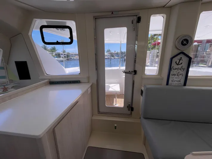 Ohana Yacht Photos Pics Interior of a 2016 Leopard 44 yacht with water view.