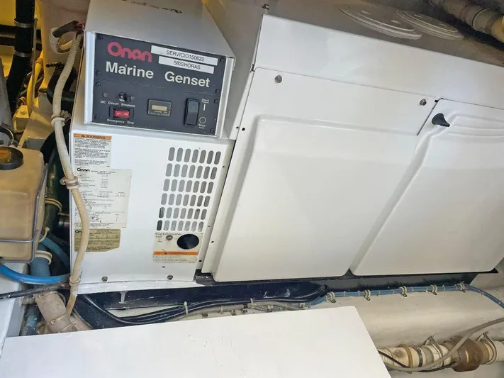  Yacht Photos Pics Onan Marine Genset in 2007 Hatteras 68 Convertible engine room.