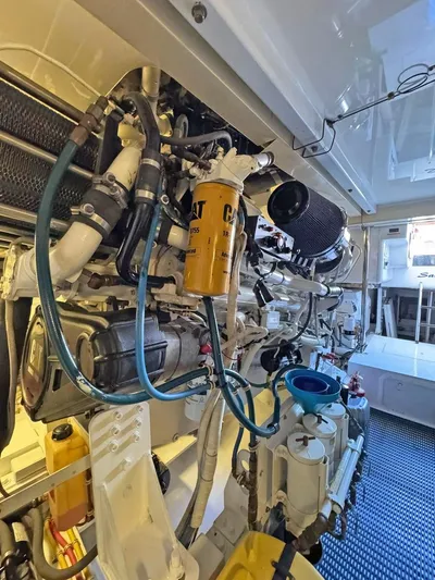  Yacht Photos Pics Engine room of 2007 Hatteras 68 Convertible yacht with visible machinery and components.