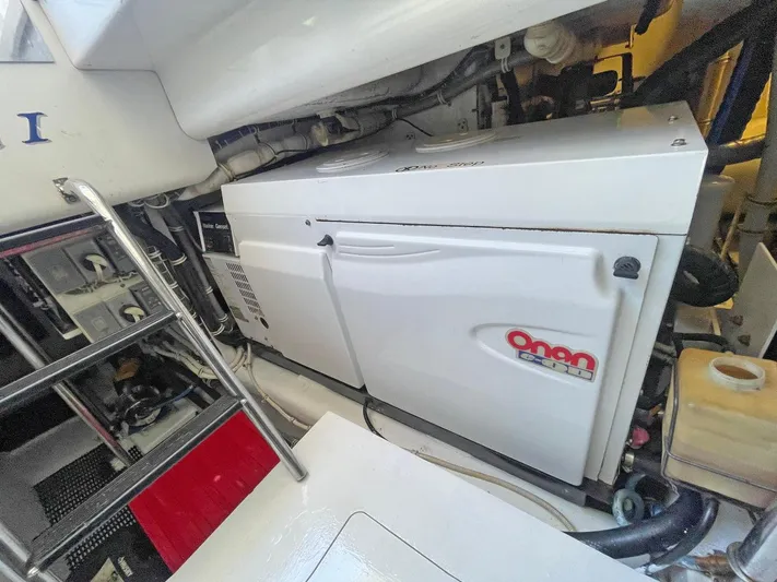  Yacht Photos Pics Engine room of 2007 Hatteras 68 Convertible with Onan generator.