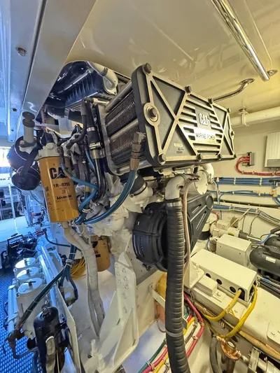  Yacht Photos Pics Engine room of 2007 Hatteras 68 Convertible yacht with CAT machinery and components.