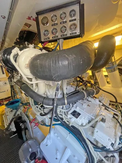  Yacht Photos Pics Engine room of 2007 Hatteras 68 Convertible yacht with visible gauges and machinery.