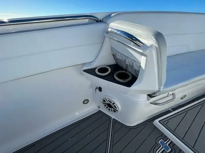 Power Slave Yacht Photos Pics 2020 Nor-Tech Center Console boat interior with cup holders and speaker.