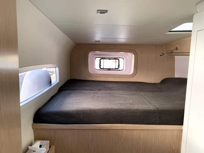 Traverse Yacht Photos Pics 2021 Outremer 51 yacht cabin with cozy bed and modern design.