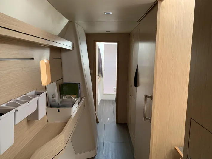Traverse Yacht Photos Pics Interior of 2021 Outremer 51 yacht, featuring sleek wooden cabinetry and modern design.