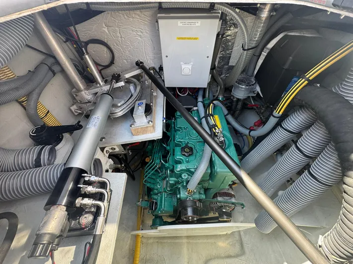 Traverse Yacht Photos Pics Engine room of 2021 Outremer 51 yacht with visible machinery and wiring.