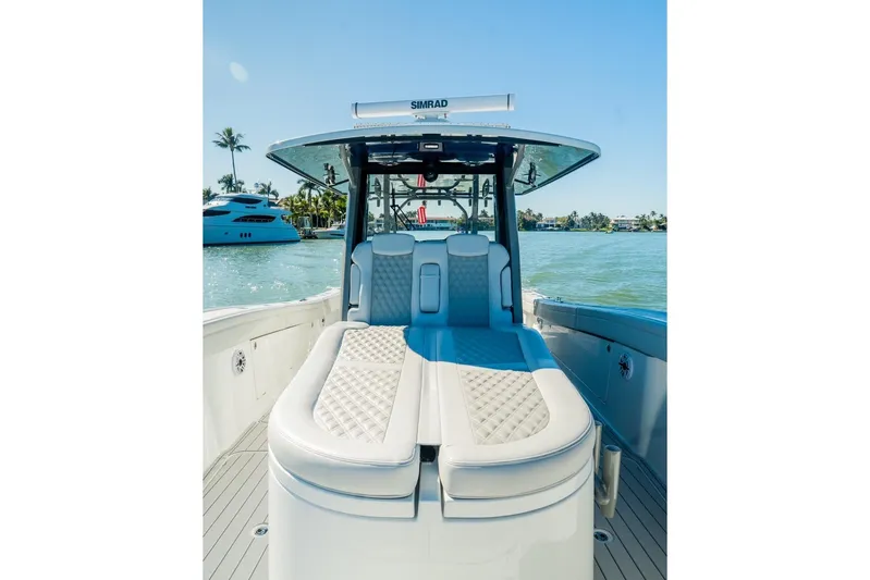  Yacht Photos Pics 2025 Costa Custom Boats 34 model with luxurious seating on a sunny day.