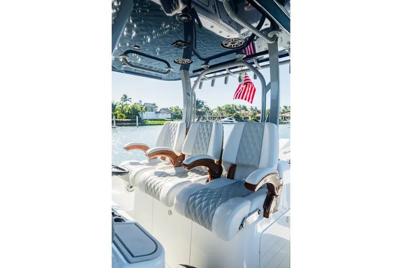  Yacht Photos Pics Luxurious seating on 2025 Costa Custom Boats 34, featuring elegant design and craftsmanship.