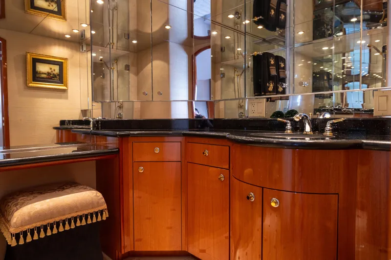 Outrageous Yacht Photos Pics Luxurious bathroom interior on 2005 Hatteras 80 Motor Yacht with elegant wood cabinetry.