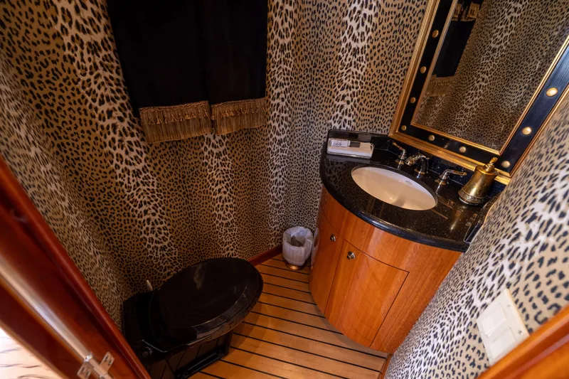 Outrageous Yacht Photos Pics Luxurious bathroom with leopard print walls on 2005 Hatteras 80 Motor Yacht.