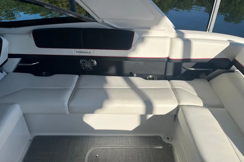 310 Bow Rider Yacht Photos Pics 2021 Formula 310 Bowrider I/O interior with white seating and sleek design.