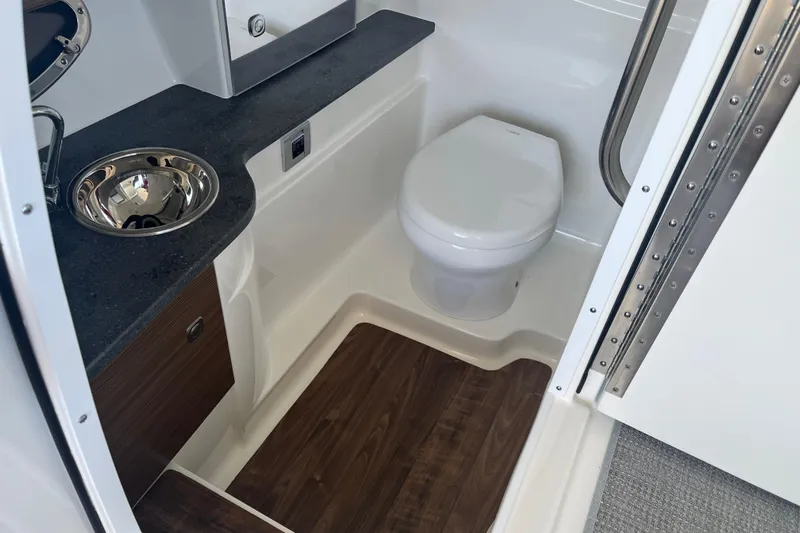 310 Bow Rider Yacht Photos Pics 2021 Formula 310 Bowrider I/O boat bathroom with sink and toilet.