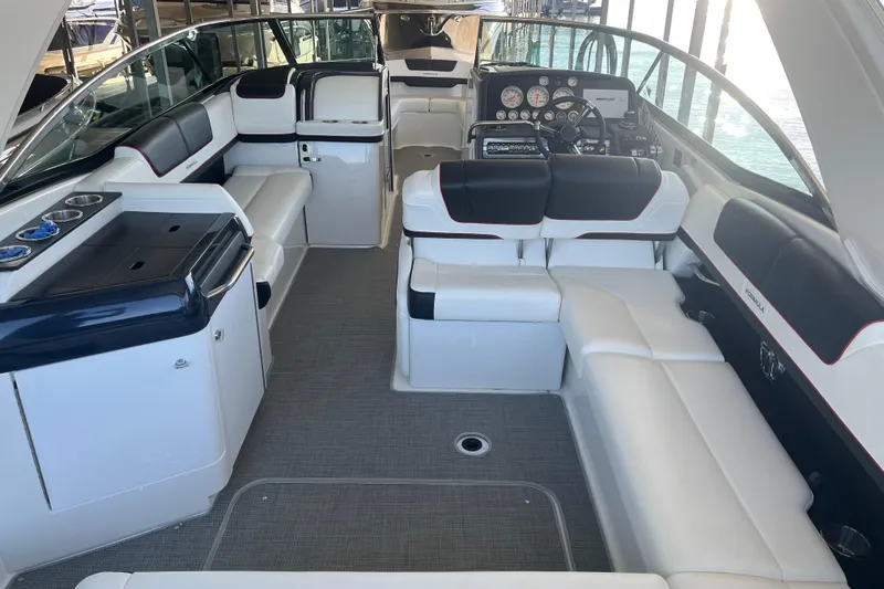 310 Bow Rider Yacht Photos Pics 2021 Formula 310 Bowrider I/O interior with luxurious seating and modern dashboard.