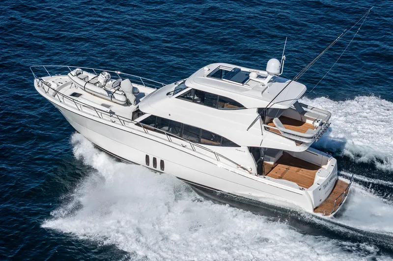 True North Yacht Photos Pics 2020 Maritimo M59 yacht cruising on open water, showcasing sleek design and luxury features.