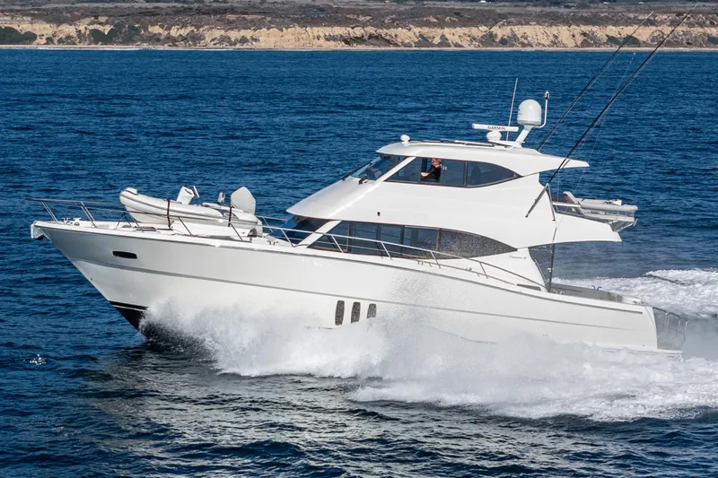 True North Yacht Photos Pics 2020 Maritimo M59 yacht cruising on open water, showcasing sleek design and performance.