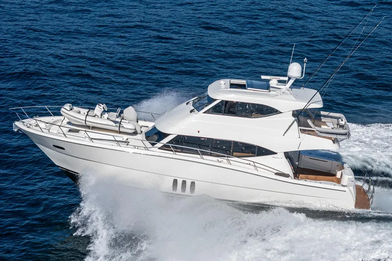 True North Yacht Photos Pics 2020 Maritimo M59 yacht cruising on open sea, showcasing sleek design and luxury.