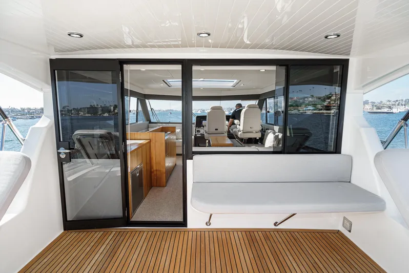True North Yacht Photos Pics 2020 Maritimo M59 yacht interior with modern seating and ocean view.