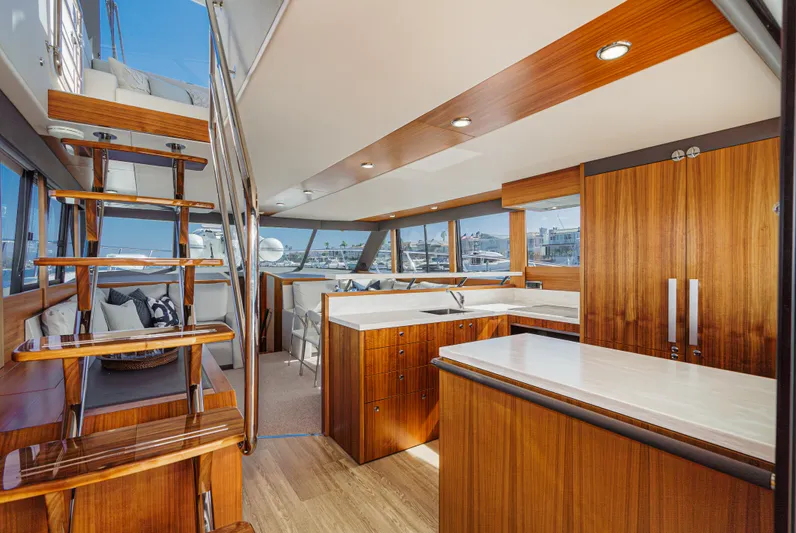 True North Yacht Photos Pics Luxurious interior of 2020 Maritimo M59 yacht with wooden finishes and modern design.