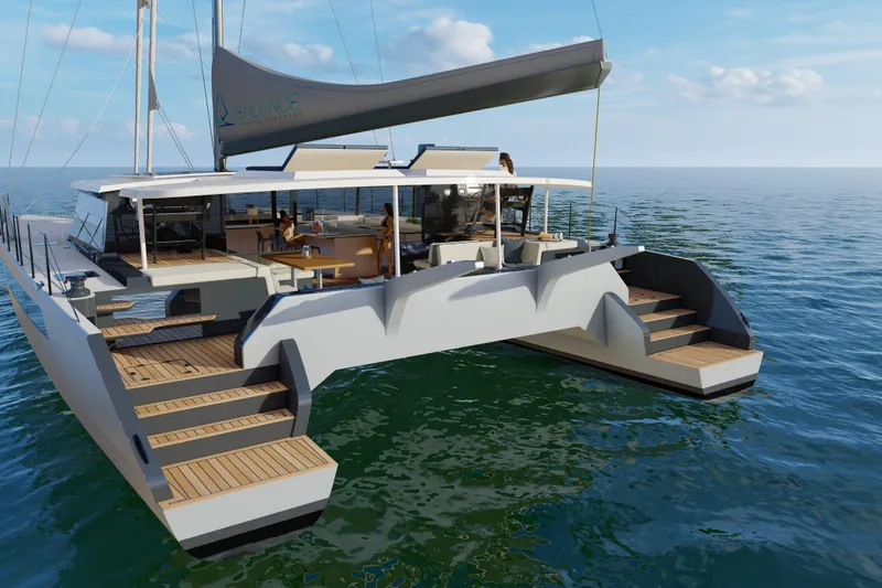 Yacht Photos Pics Luxury Balance 750 catamaran sailing on open sea, 2027 model, featuring spacious deck and modern design.