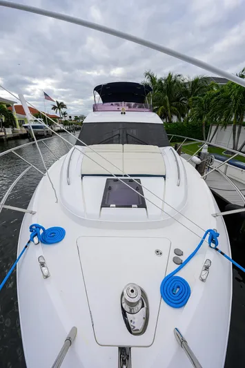  Yacht Photos Pics 2022 Princess F50 yacht docked, featuring sleek design and vibrant blue ropes.