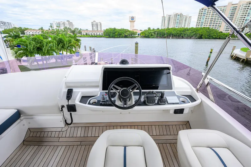  Yacht Photos Pics Helm of 2022 Princess F50 yacht with waterfront view.
