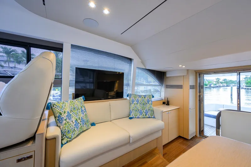  Yacht Photos Pics Luxurious 2022 Princess F50 yacht interior with modern seating and scenic views.