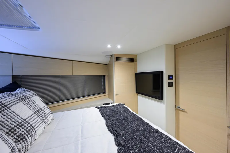  Yacht Photos Pics Luxurious cabin interior of 2022 Princess F50 yacht with modern decor and amenities.