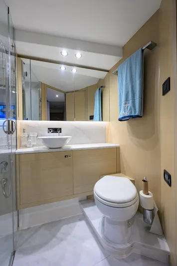  Yacht Photos Pics Modern bathroom in 2022 Princess F50 yacht, featuring sleek design and elegant fixtures.
