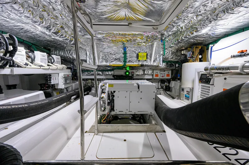  Yacht Photos Pics Engine room of 2022 Princess F50 yacht, featuring advanced machinery and insulation.