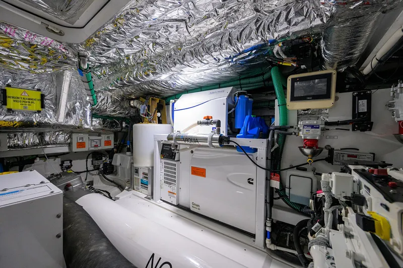  Yacht Photos Pics Engine room of 2022 Princess F50 yacht, featuring advanced equipment and insulation.