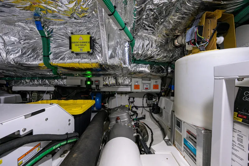  Yacht Photos Pics Engine room of 2022 Princess F50 yacht with insulated pipes and electrical systems.