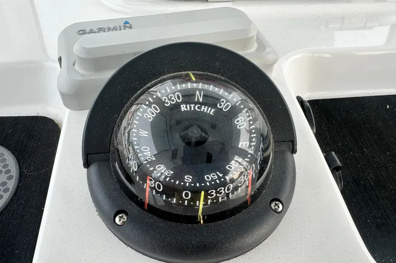  Yacht Photos Pics Compass on 2023 Sportsman Open 282 Center Console boat dashboard.