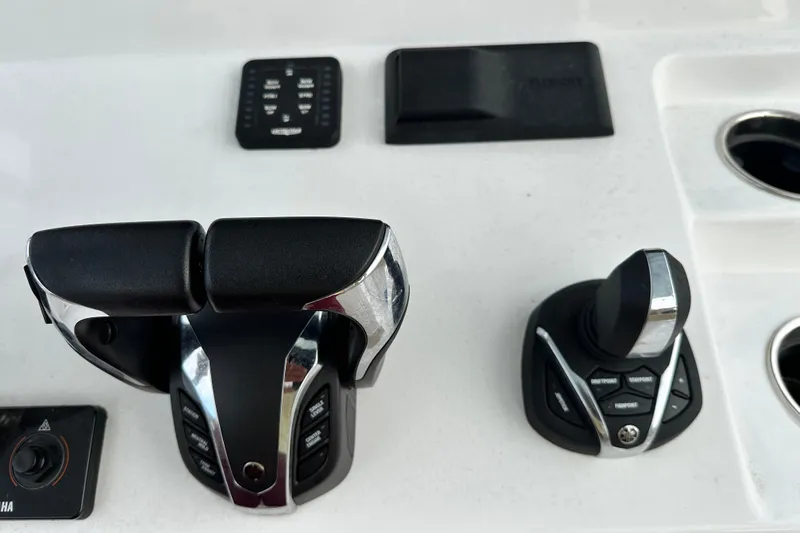  Yacht Photos Pics 2023 Sportsman Open 282 Center Console controls with throttle and joystick.
