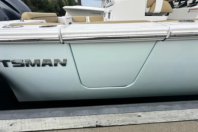  Yacht Photos Pics 2023 Sportsman Open 282 Center Console boat side view with seating details.