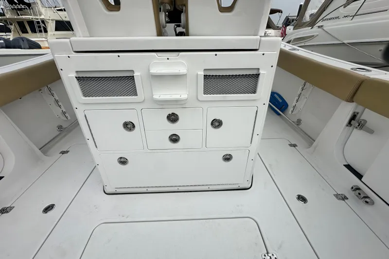  Yacht Photos Pics 2023 Sportsman Open 282 Center Console boat interior with storage compartments.