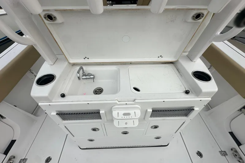  Yacht Photos Pics 2023 Sportsman Open 282 Center Console boat sink and storage area.