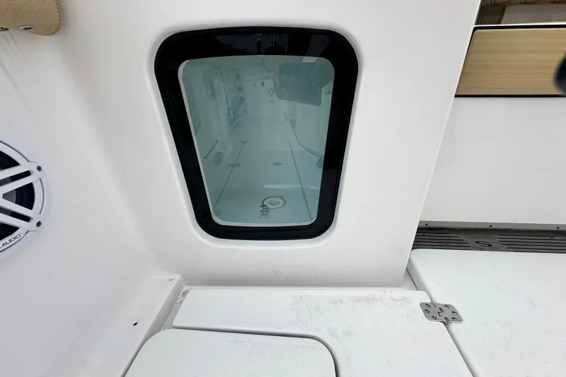  Yacht Photos Pics 2023 Sportsman Open 282 Center Console boat interior window and speaker detail.